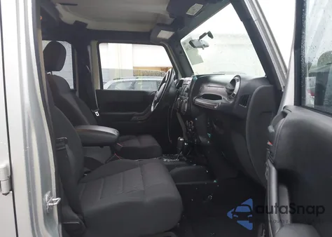 2012 Jeep Wrangler Unlimited Sport z USA, uszkodzony, nr VIN 1C4BJWDG1CL269417